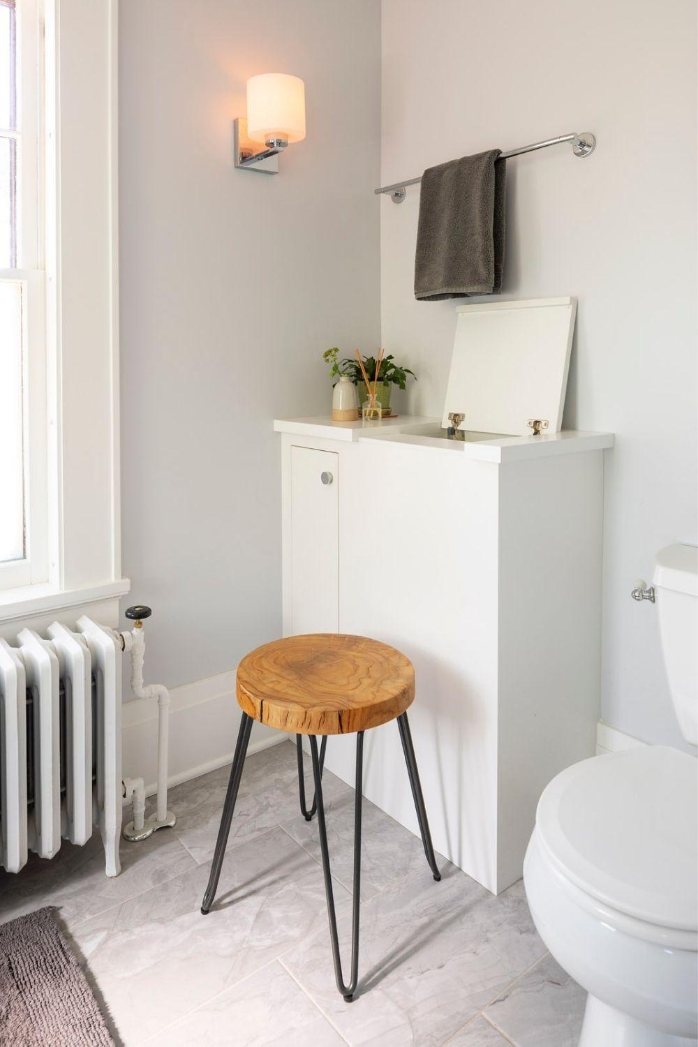 laundry chute opened with small stool