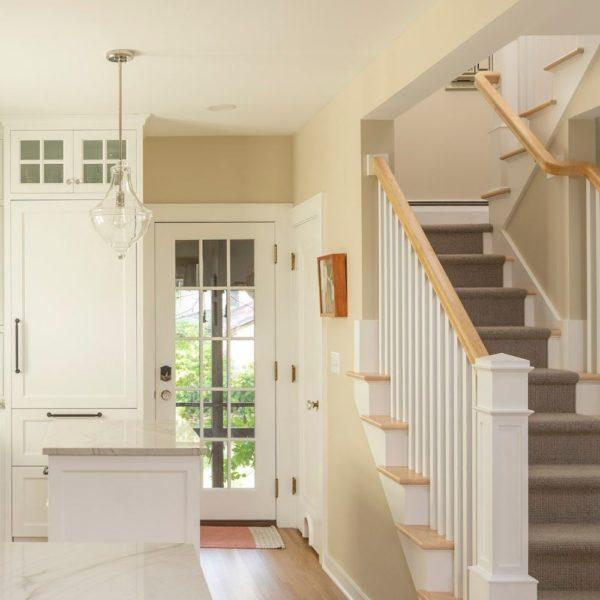 kitchen, staircase, cat door leading to basement