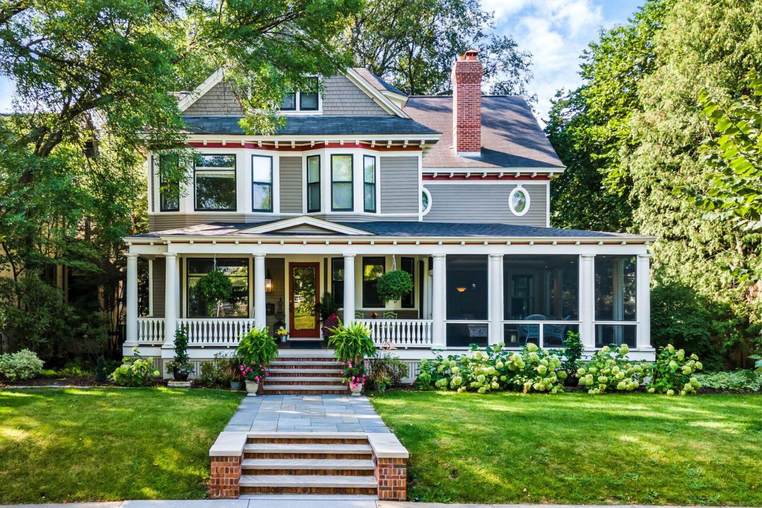 Updated porch design with wood columns and new railings in Summit Hill