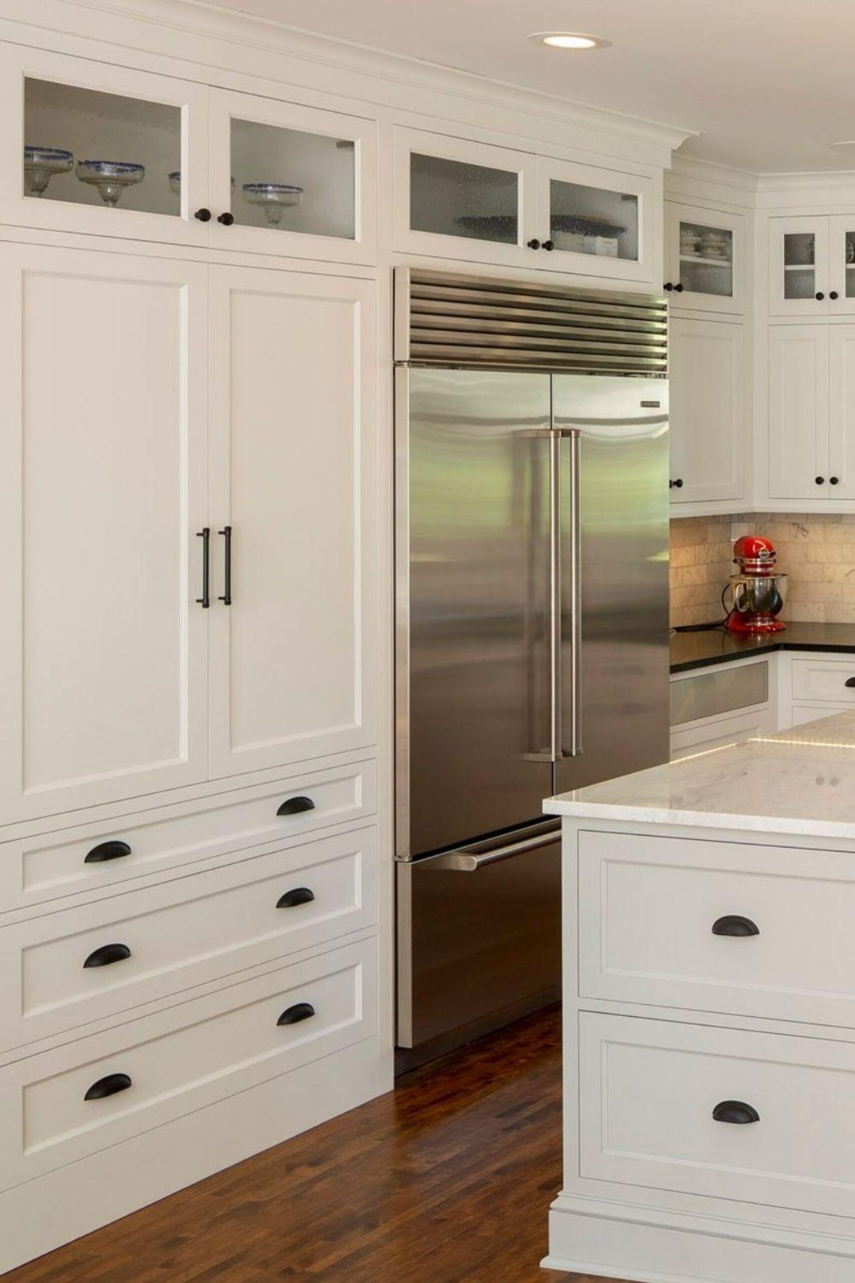 sub zero fridge, cabinets, storage