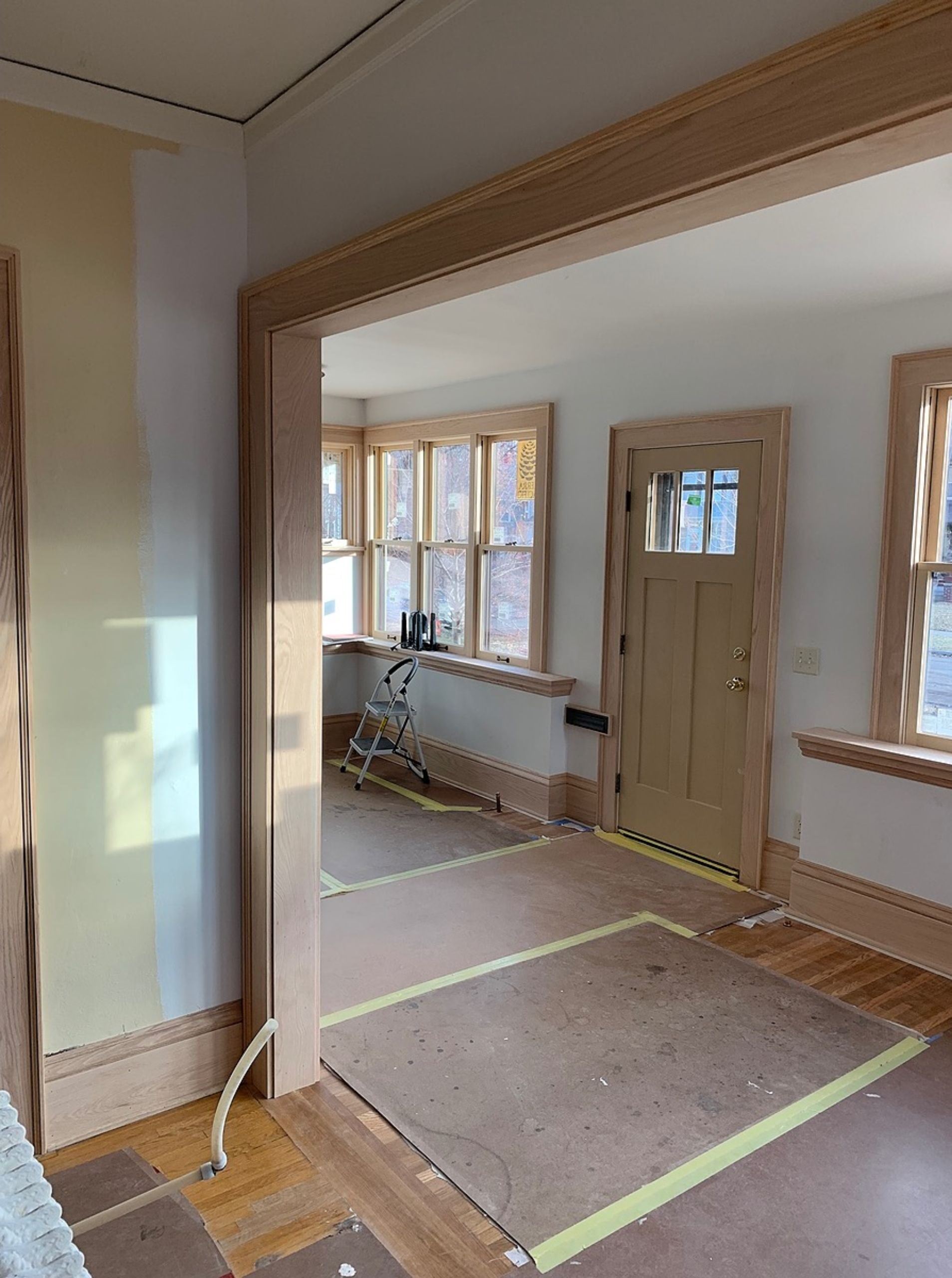 in progress home remodeling project with floor protection