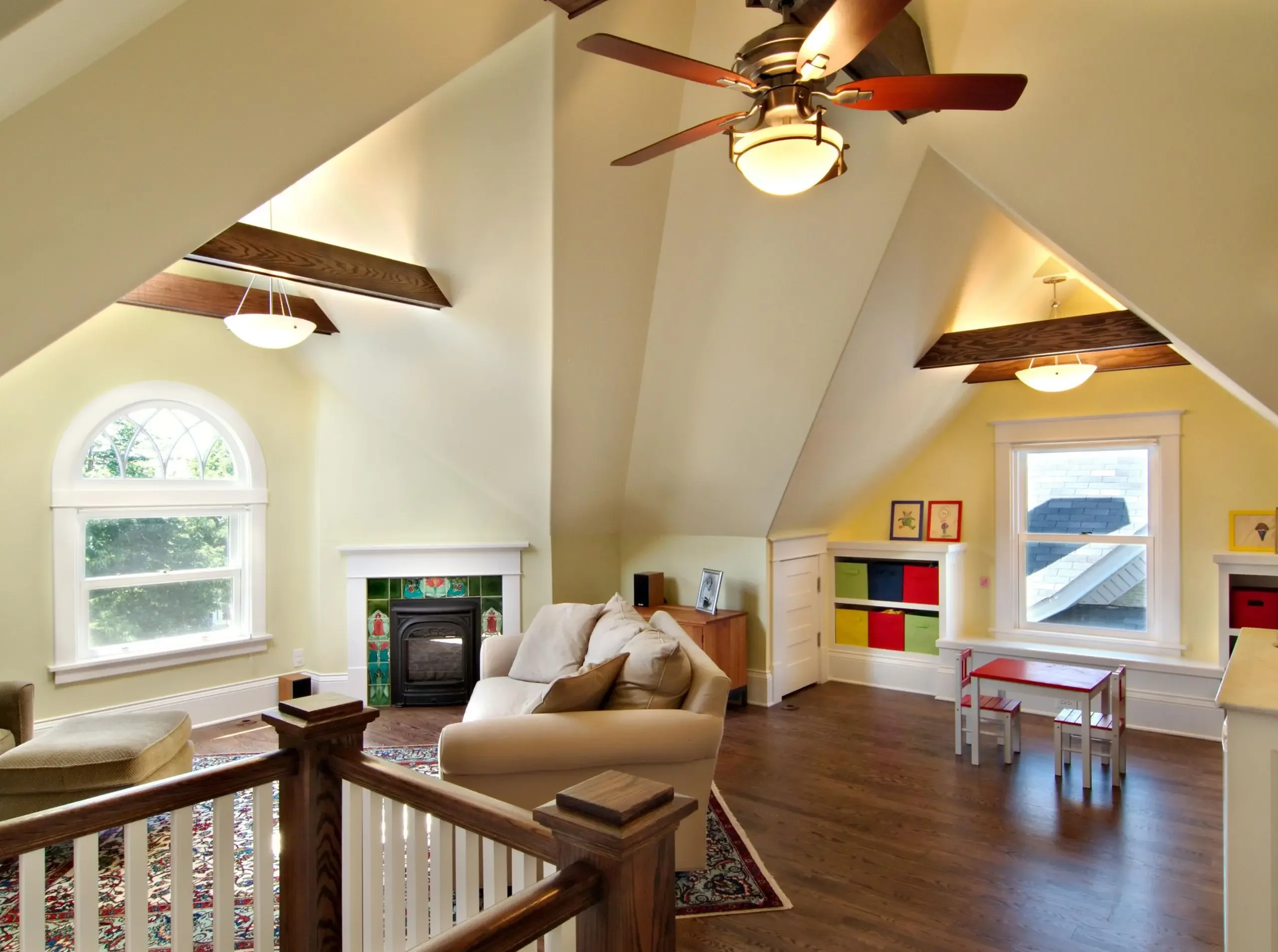 family room with high vaulted attic ceilings with beams