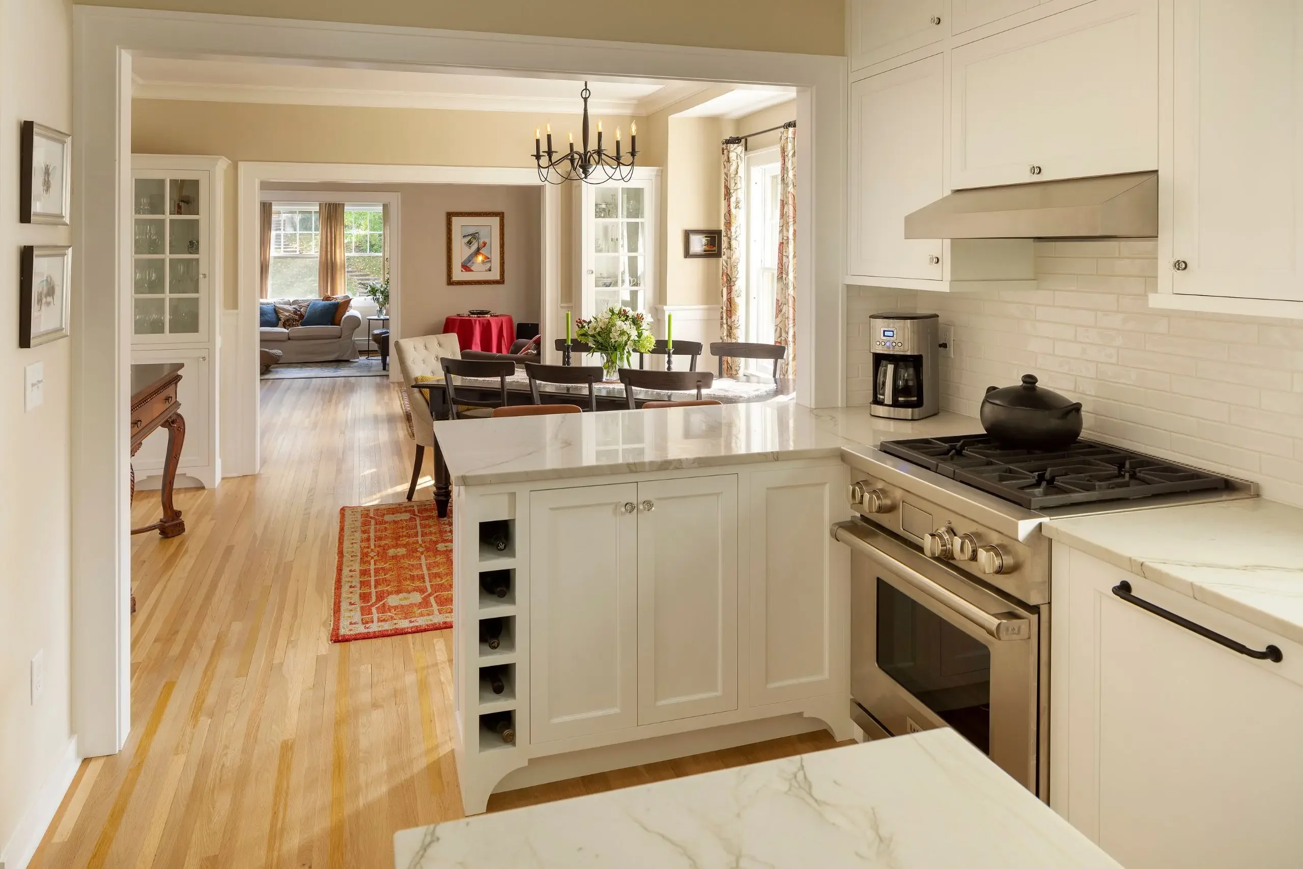 Open-concept kitchen remodel in an older home with improved connection to adjacent living spaces