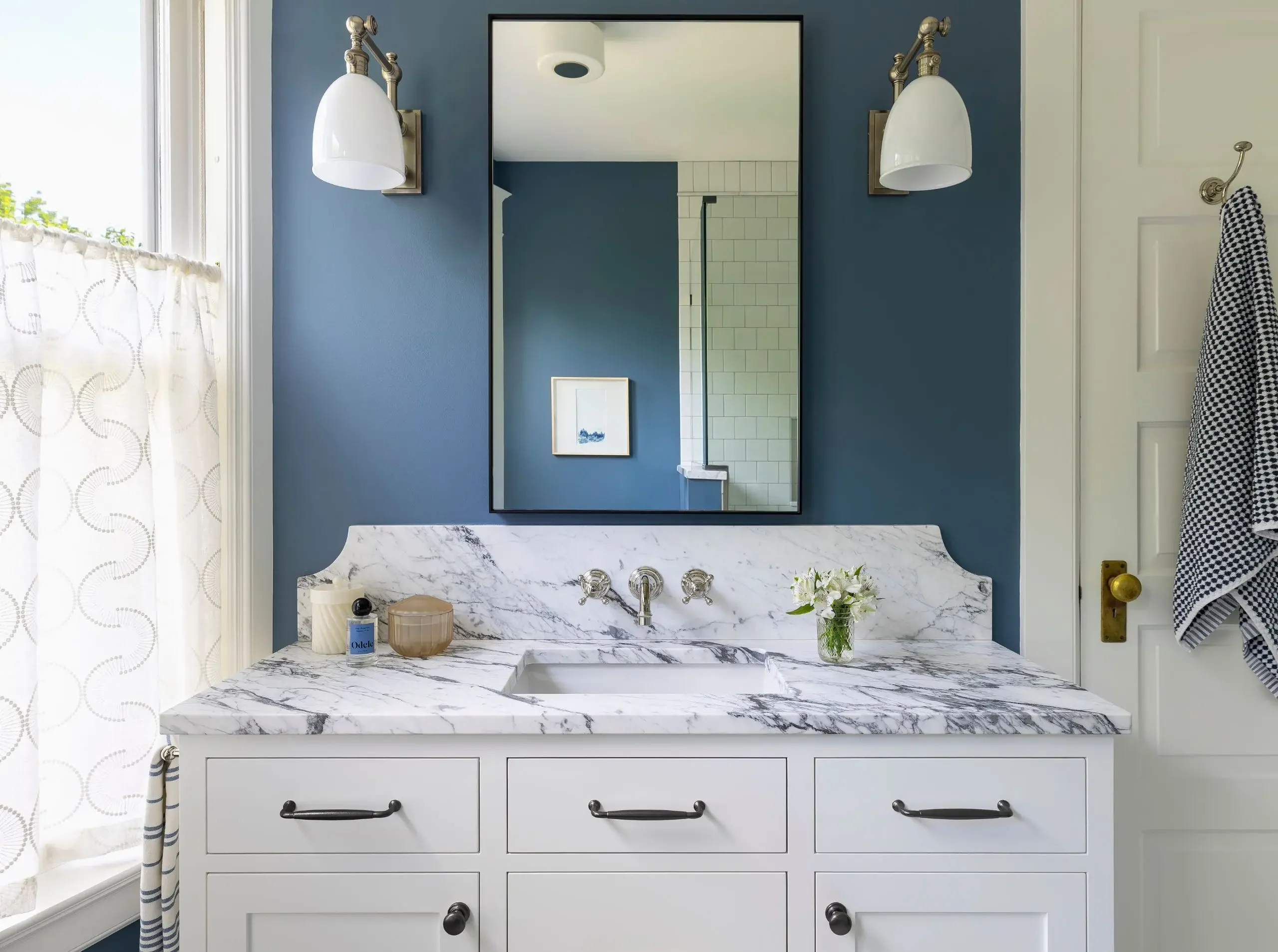 Historic primary bathroom remodel in Summit Hill, St. Paul with custom vanity stone