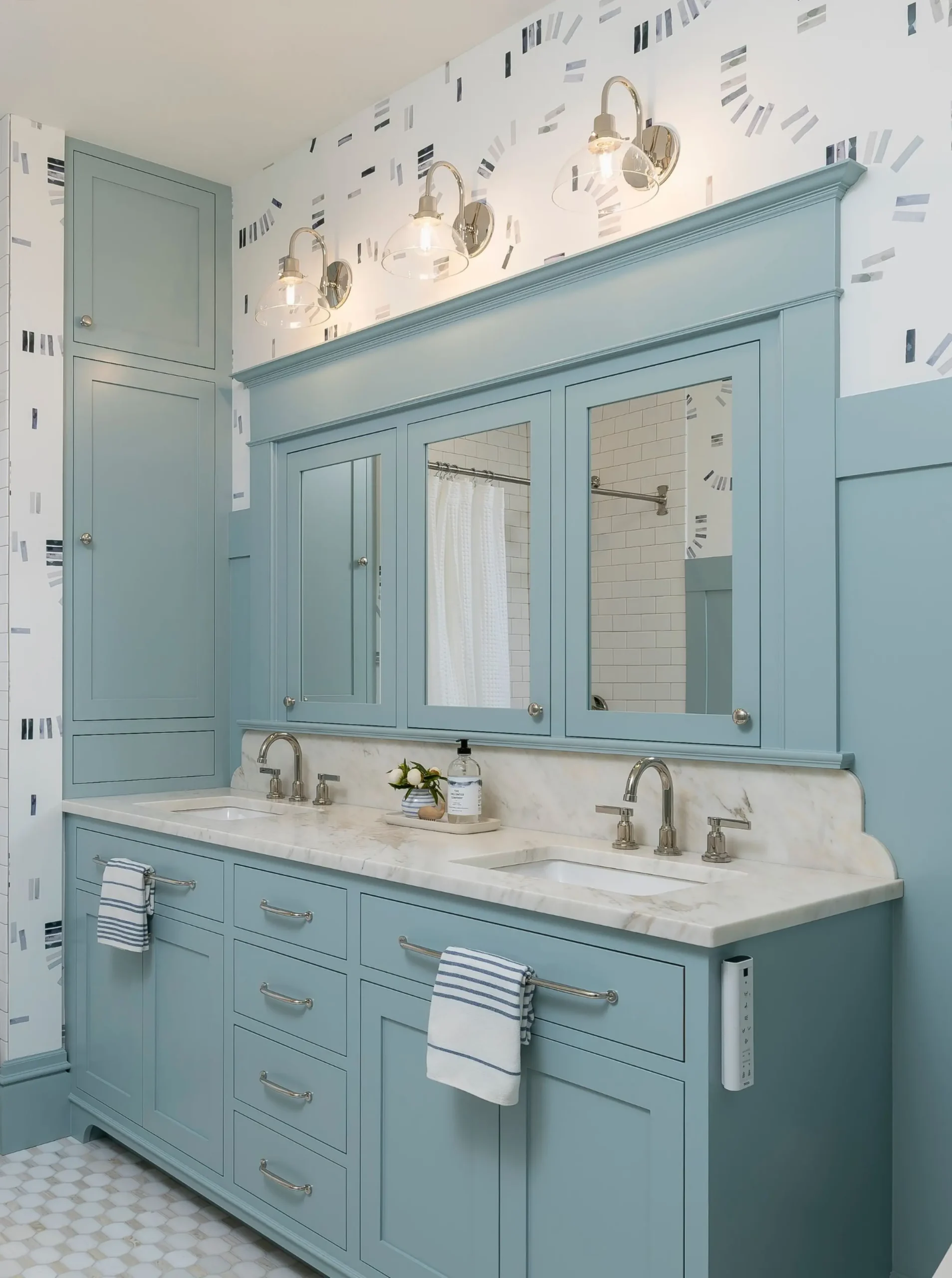 Custom millwork in a traditional family bathroom