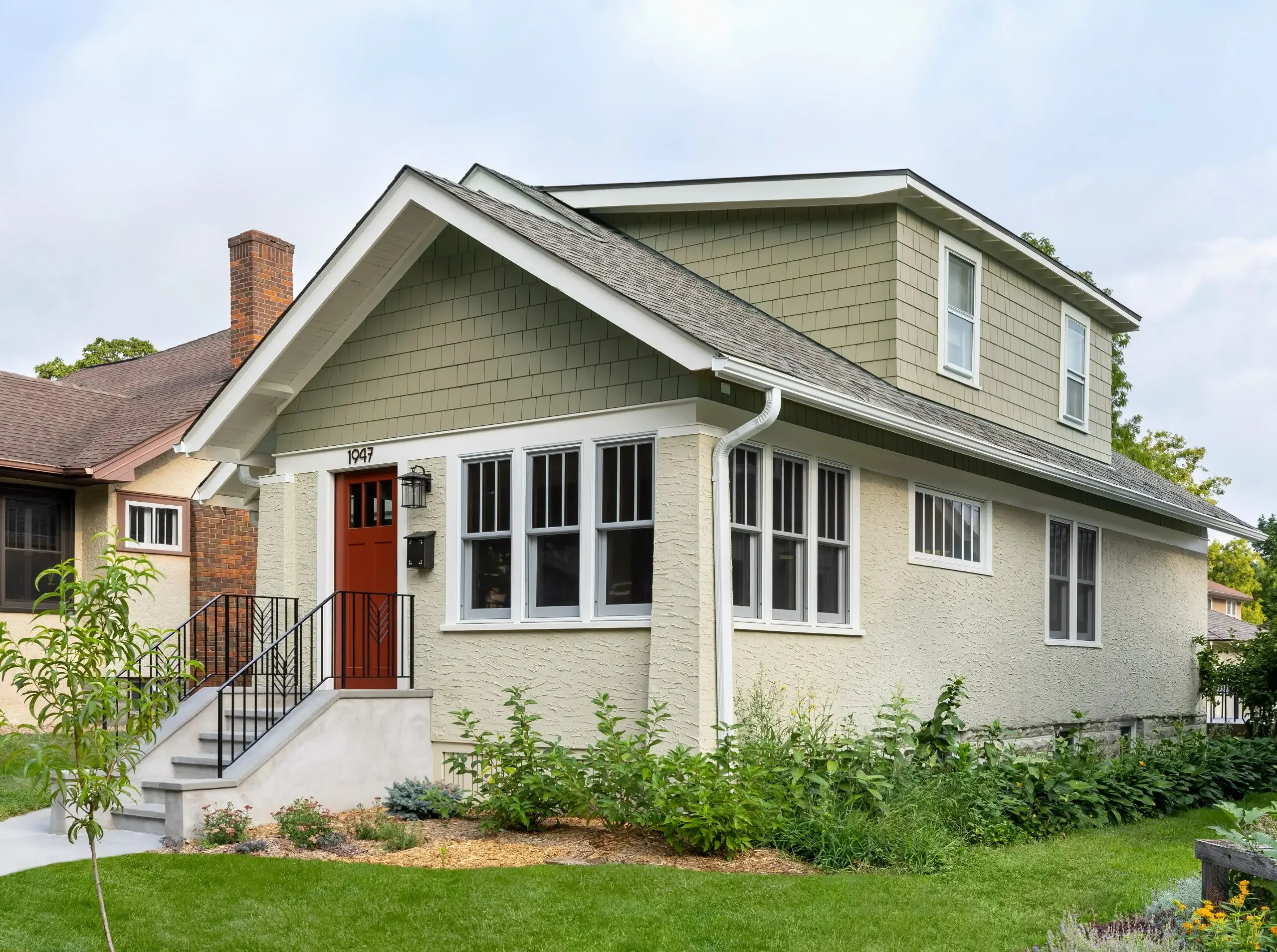 Restored bungalow exterior with enclosed four-season front porch